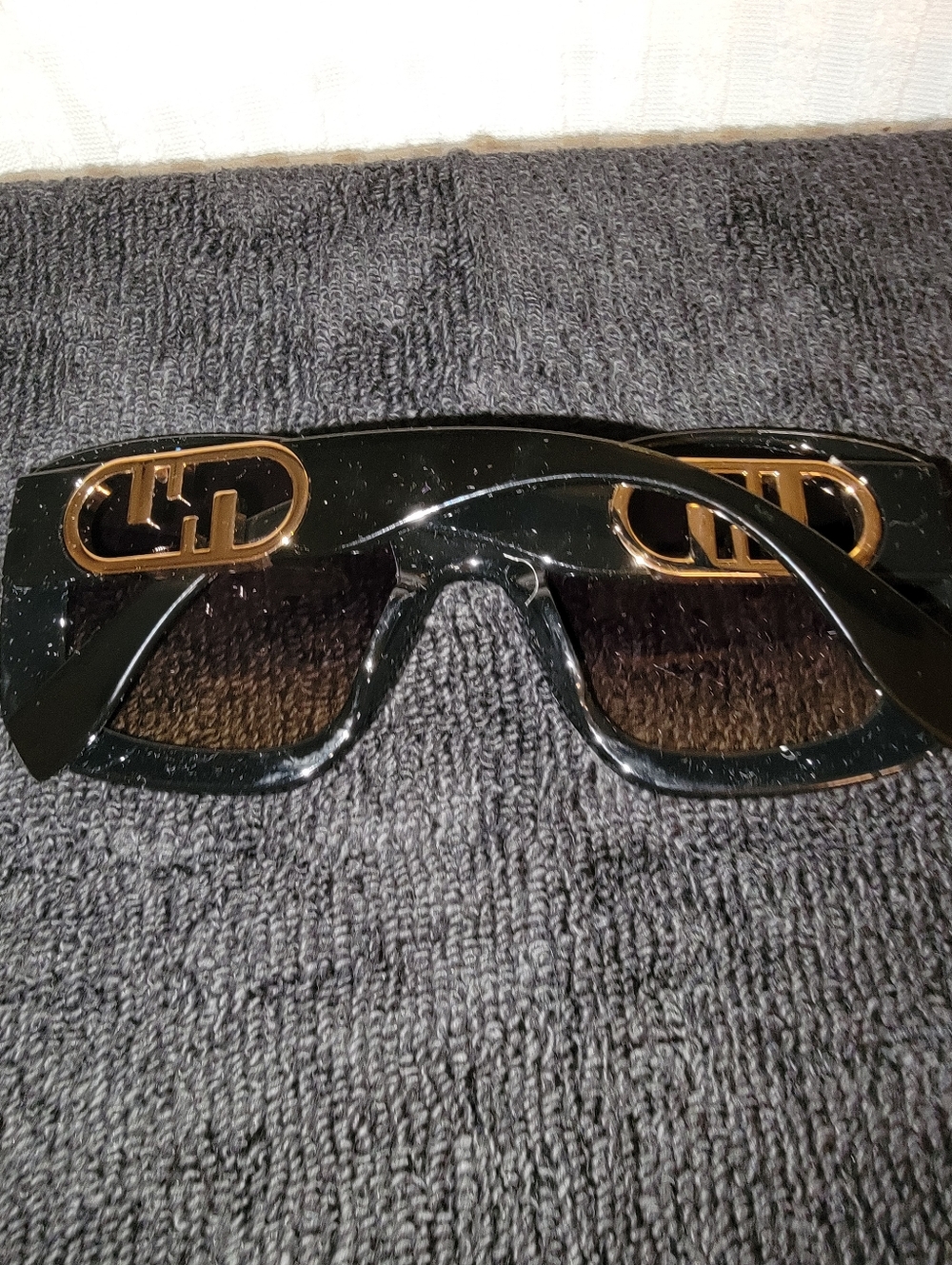 Black Rectangular Sunglasses with Gold Logo Accent